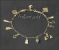 Preview: Bettelarmband aus 585 Gelbgold, mit 12 Anhängern
