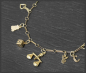 Preview: Bettelarmband aus 585 Gelbgold, mit 12 Anhängern