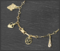 Preview: Bettelarmband aus 585 Gelbgold, mit 12 Anhängern